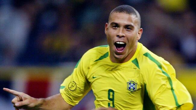 Brazil's forward Ronaldo celebrates after scoring the first goal against Turkey during the semi-final match of the FIFA 2002 World Cup Korea Japan 26 June, 2002, in Saitama, Japan. AFP PHOTO/PATRICK HERTZOG / AFP PHOTO / - (Photo credit should read -/AFP via Getty Images)