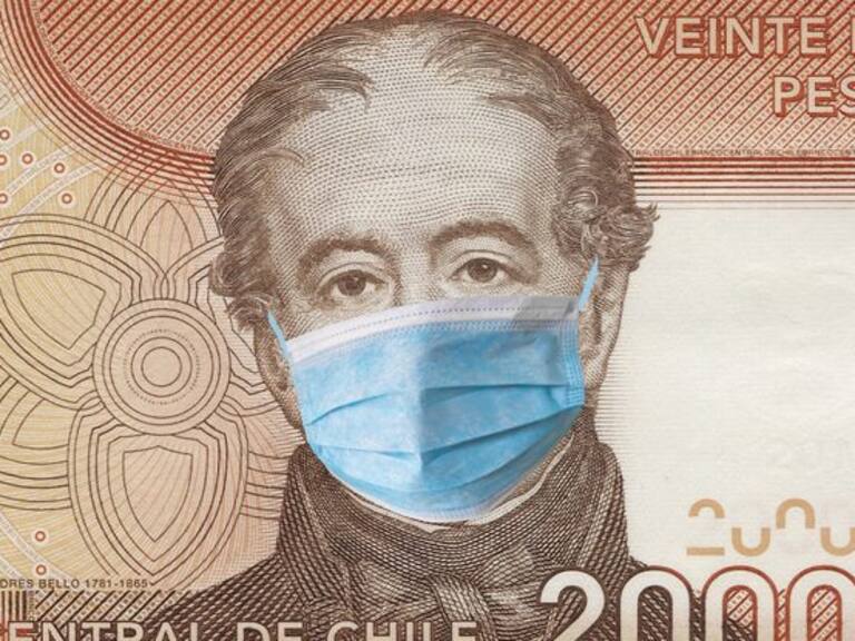 Covid-19. Chlie quarantine, 20000 pesos banknote with medical mask. The concept of epidemic and protection against coronavrius.