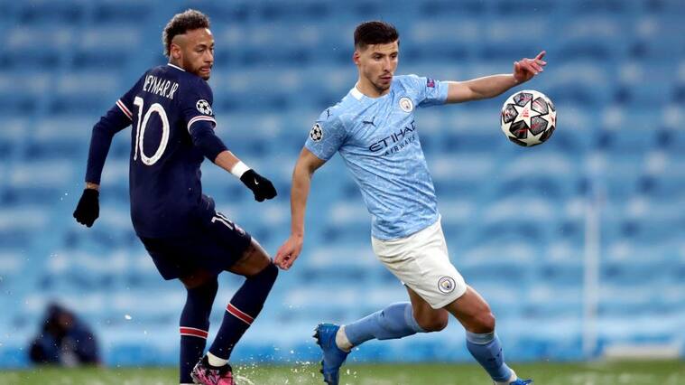 MANCHESTER, ENGLAND - MAY 04: Ruben Dias of Manchester City is challenged by Neymar of Paris Saint-Germain during the UEFA Champions League Semi Final Second Leg match between Manchester City and Paris Saint-Germain at Etihad Stadium on May 04, 2021 in Manchester, England. Sporting stadiums around the UK remain under strict restrictions due to the Coronavirus Pandemic as Government social distancing laws prohibit fans inside venues resulting in games being played behind closed doors. (Photo by Jan Kruger - UEFA/UEFA via Getty Images)