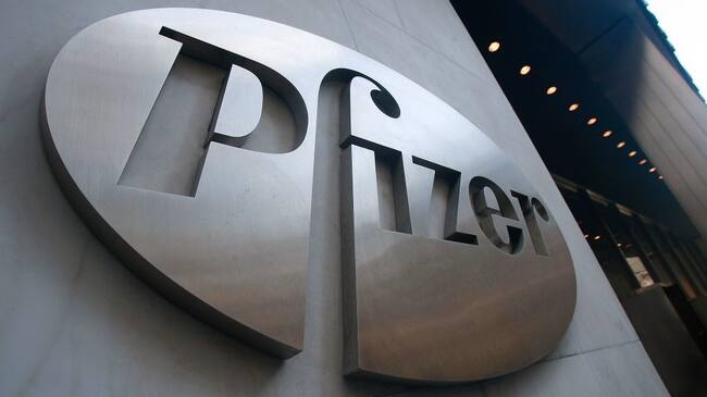 NEW YORK - JANUARY 26: A Pfizer sign hangs on the outside of their headquarters after a news conference discussing the planned merger of Pfizer and Wyeth January 26, 2009 in New York City. Pfizer plans to acquire Wyeth for $68 billion creating the world's largest biopharmaceutical company. (Photo by Mario Tama/Getty Images)
