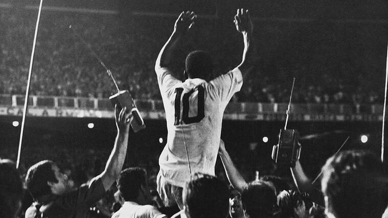 Pele is lifted up by his Santos team mates after scoring the 1,000th goal of his career during a game against Vasco da Gama at the Maracana Stadium, Rio de Janeiro, Brazil, 19th November 1969. (Photo by Pictorial Parade/Archive Photos/Getty Images)