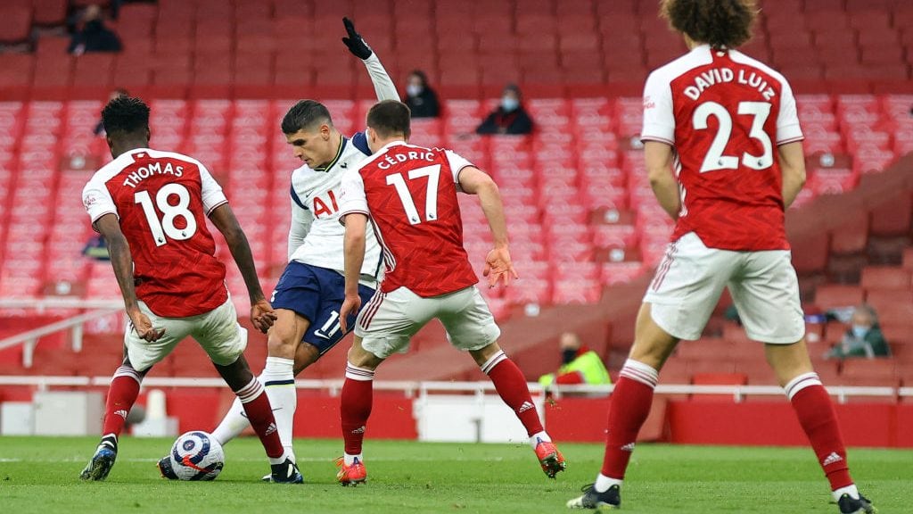 Tottenham Hotspur's Argentinian midfielder Erik Lamela (2nd L) kicks a rabona shot to score the opening goal during the English Premier League football match between Arsenal and Tottenham Hotspur at the Emirates Stadium in London on March 14, 2021. - - RESTRICTED TO EDITORIAL USE. No use with unauthorized audio, video, data, fixture lists, club/league logos or 'live' services. Online in-match use limited to 120 images. An additional 40 images may be used in extra time. No video emulation. Social media in-match use limited to 120 images. An additional 40 images may be used in extra time. No use in betting publications, games or single club/league/player publications. (Photo by Julian Finney / POOL / AFP) / RESTRICTED TO EDITORIAL USE. No use with unauthorized audio, video, data, fixture lists, club/league logos or 'live' services. Online in-match use limited to 120 images. An additional 40 images may be used in extra time. No video emulation. Social media in-match use limited to 120 images. An additional 40 images may be used in extra time. No use in betting publications, games or single club/league/player publications. / RESTRICTED TO EDITORIAL USE. No use with unauthorized audio, video, data, fixture lists, club/league logos or 'live' services. Online in-match use limited to 120 images. An additional 40 images may be used in extra time. No video emulation. Social media in-match use limited to 120 images. An additional 40 images may be used in extra time. No use in betting publications, games or single club/league/player publications. (Photo by JULIAN FINNEY/POOL/AFP via Getty Images)