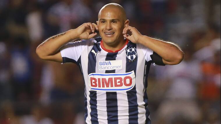 QUERETARO, MEXICO - AUGUST 29: Humberto Suazo of Monterrey celebrates after scoring the only goal of a match between Queretaro and Monterrey as part of 7th round Apertura 2014 Liga MX at Corregidora Stadium on August 29, 2014 in Queretaro, Mexico. (Photo by Hector Vivas/LatinContent via Getty Images)