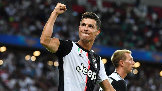SINGAPORE, SINGAPORE - JULY 21: Cristiano Ronaldo of Juventus celebrates scoring his side's second goal during the International Champions Cup match between Juventus and Tottenham Hotspur at the Singapore National Stadium on July 21, 2019 in Singapore. (Photo by Thananuwat Srirasant/Getty Images)