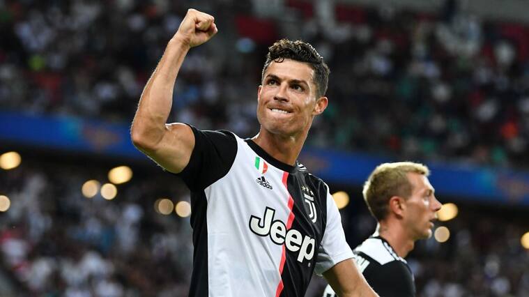 SINGAPORE, SINGAPORE - JULY 21: Cristiano Ronaldo of Juventus celebrates scoring his side's second goal during the International Champions Cup match between Juventus and Tottenham Hotspur at the Singapore National Stadium on July 21, 2019 in Singapore. (Photo by Thananuwat Srirasant/Getty Images)
