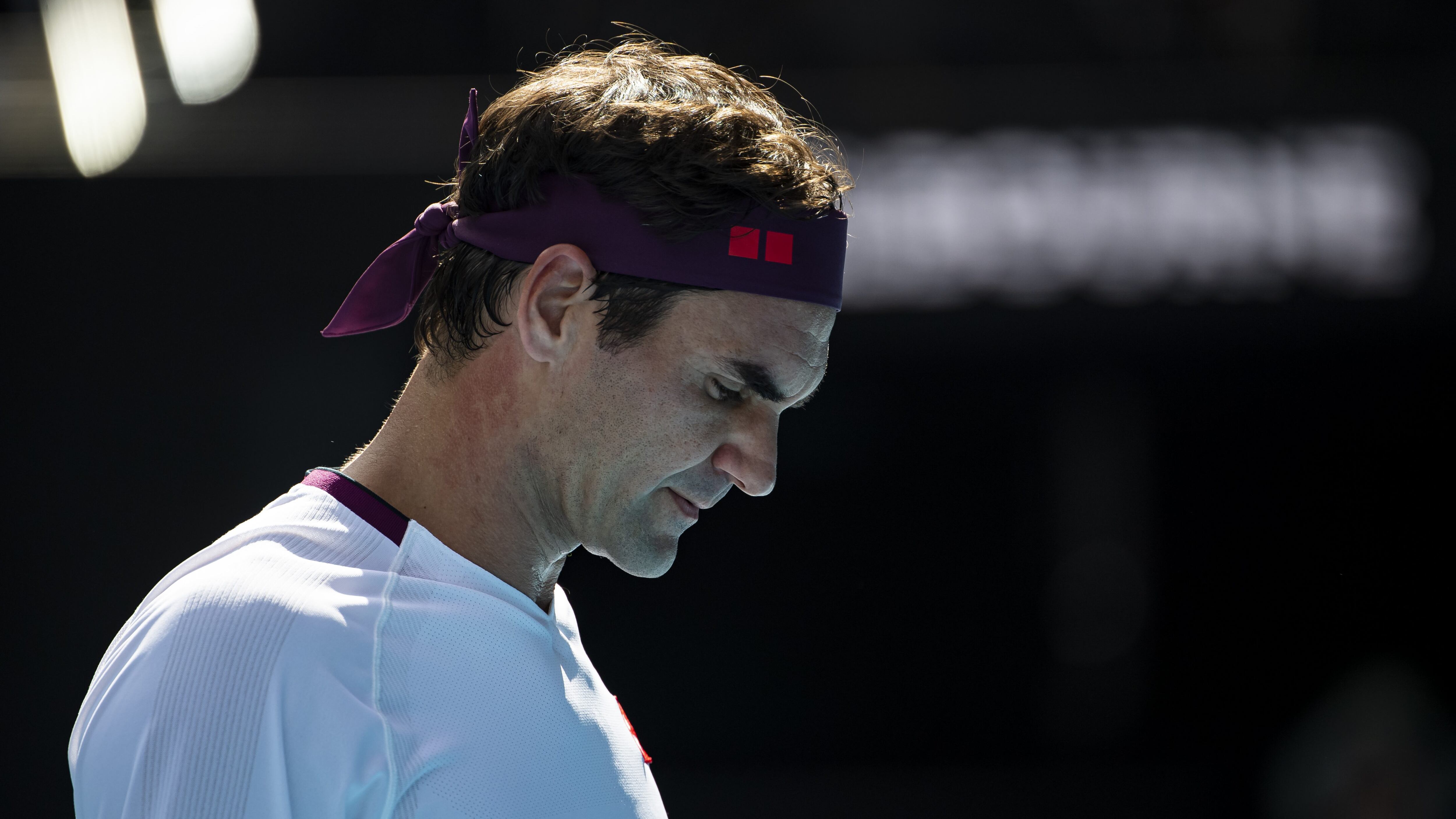 MELBOURNE, AUSTRALIA - JANUARY 28: Roger Federer of Switzerland looks dejected during his quarter final match against Tennys Sandgren of the United States on day nine of the 2020 Australian Open at Melbourne Park on January 28, 2020 in Melbourne, Australia. (Photo by TPN/Getty Images)