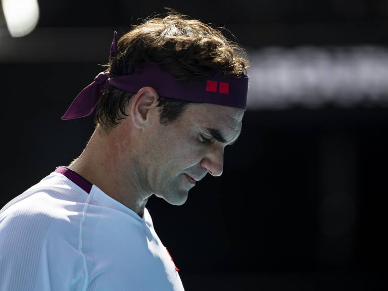 MELBOURNE, AUSTRALIA - JANUARY 28: Roger Federer of Switzerland looks dejected during his quarter final match against Tennys Sandgren of the United States on day nine of the 2020 Australian Open at Melbourne Park on January 28, 2020 in Melbourne, Australia. (Photo by TPN/Getty Images)