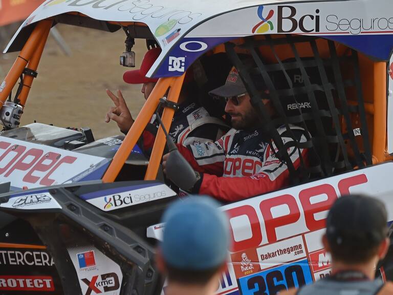 Chile's driver Francisco Lopez (R) and co-driver Alvaro Juan Leon on their SxS are pictured during the departure ceremony of the 2019 Dakar Rally in Lima, on January 6, 2019. - The Dakar Rally 2019 brings together 334 vehicles -motorcycles, 4-wheel drives, and trucks- with drivers from 61 nations, 17 of which are women. Due to economic and political concerns that caused the withdrawal of other countries in the region, this will be the first time the Dakar Rally is held in one country. (Photo by Cris BOURONCLE / AFP) (Photo credit should read CRIS BOURONCLE/AFP via Getty Images)
