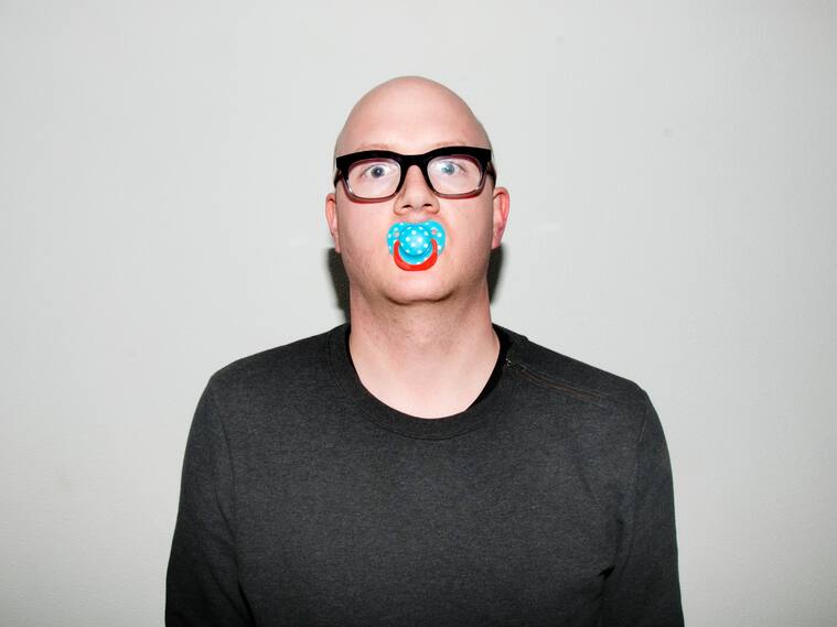 Acting like a baby, (self-)portrait of an adult wearing a dummy teat.