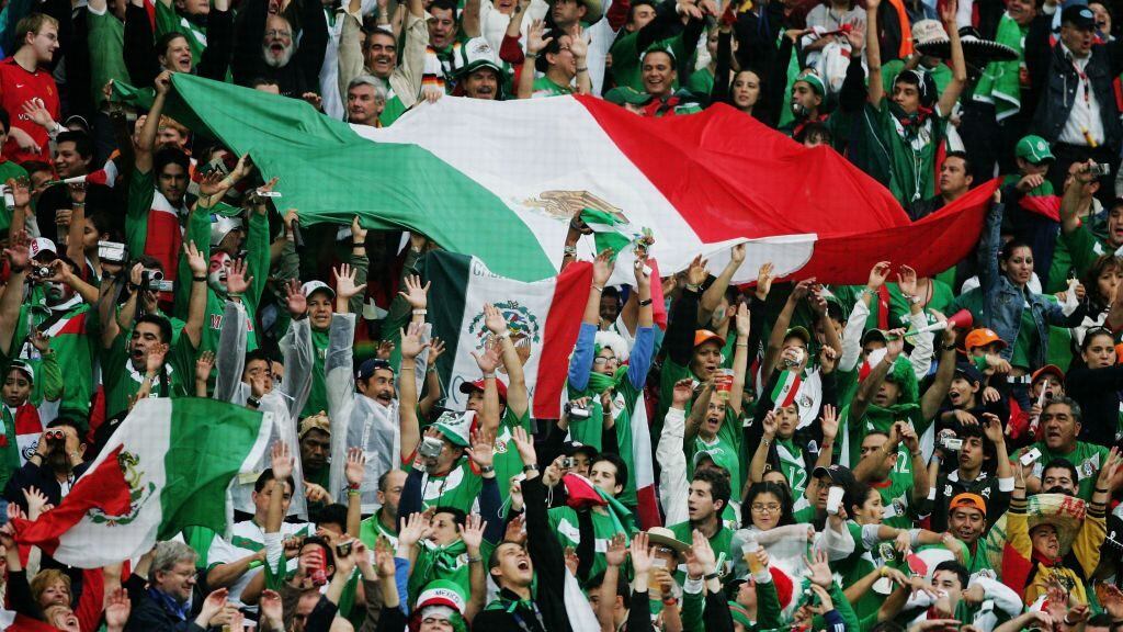 HANOVER, GERMANY - JUNE 16: Mexican fans perform a Mexican wave during the FIFA World Cup Germany 2006 Group D match between Mexico and Angola played at the Stadium Hanover on June 16, 2006 in Hanover, Germany. (Photo by Alex Livesey/Getty Images)