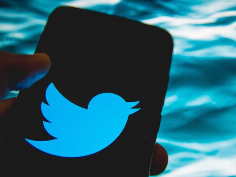 In this photo illustration Twitter logo is displayed on a smartphone screen in Athens, Greece on April 14, 2021. (Photo by Nikolas Kokovlis/NurPhoto via Getty Images)