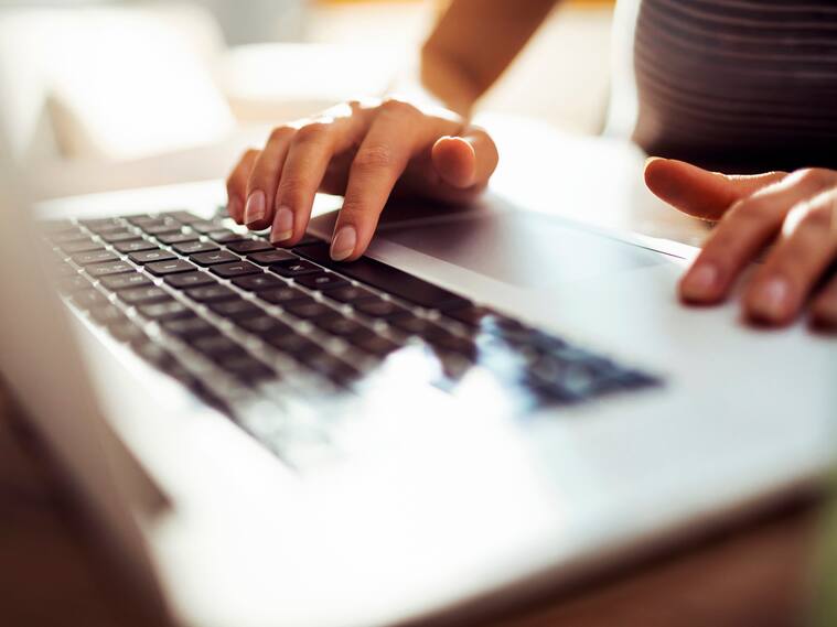 Close up of a young woman working from home
