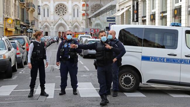French policemen stand guard the street leading to the Basilica of Notre-Dame de Nice after a knife attack in Nice on October 29, 2020. - France's national anti-terror prosecutors said Thursday they have opened a murder inquiry after a man killed three people at a basilica in central Nice and wounded several others. The city's mayor, Christian Estrosi, told journalists at the scene that the assailant, detained shortly afterwards by police, "kept repeating 'Allahu Akbar' (God is Greater) even while under medication." He added that President Emmanuel Macron would be arriving shortly in Nice. (Photo by Valery HACHE / AFP) (Photo by VALERY HACHE/AFP via Getty Images)