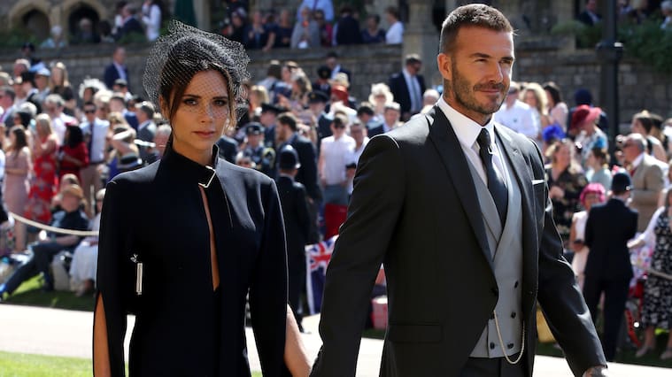 WINDSOR, UNITED KINGDOM - MAY 19: Victoria Beckham and David Beckham arrives for the wedding ceremony of Britain's Prince Harry and US actress Meghan Markle at St George's Chapel, Windsor Castle on May 19, 2018 in Windsor, England. (Photo by Chris Radburn - WPA Pool/Getty Images)