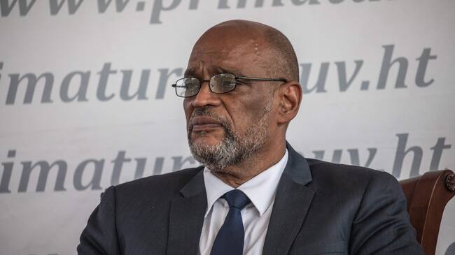 Designated Prime Minister Ariel Henry looks on during a ceremony at La Primature in Port-au-Prince, Haiti, on July 20, 2021. - The ceremony comes as designated Prime Minister Ariel Henry prepared to replace interim Prime Minister Claude Joseph, after the July 7 attack at Moïse's private home. (Photo by Valerie Baeriswyl / AFP) (Photo by VALERIE BAERISWYL/AFP via Getty Images)
