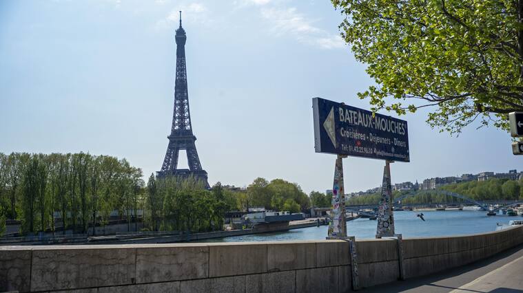 PARIS, FRANCE - APRIL 13: A view of the Eiffel Tower from empty river banks on April 13, 2020 in Paris, France. Due to the COVID-19 outbreak in France, traditional Easter celebrations will not be able to take place as planned. The Coronavirus (COVID-19) pandemic has spread to many countries across the world, claiming over 110,000 lives and infecting over 1. 8 million people. (Photo by Aurelien Meunier/Getty Images)