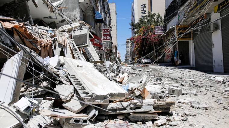 Al-Walid building which was destroyed in an Israeli airstrike on Gaza city, on May 13, 2021. (Photo by Sameh Rahmi/NurPhoto via Getty Images)