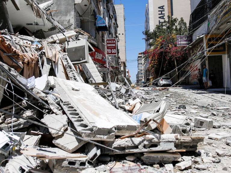 Al-Walid building which was destroyed in an Israeli airstrike on Gaza city, on May 13, 2021. (Photo by Sameh Rahmi/NurPhoto via Getty Images)