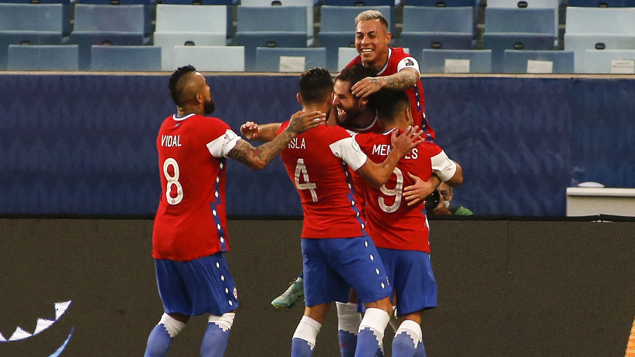 Chile's Ben Brereton (C) celebrates with teammates after scoring against Bolivia during their Conmebol Copa America 2021 football tournament group phase match at the Pantanal Arena in Cuiaba, Brazil, on June 18, 2021. (Photo by SILVIO AVILA / AFP) (Photo by SILVIO AVILA/AFP via Getty Images)