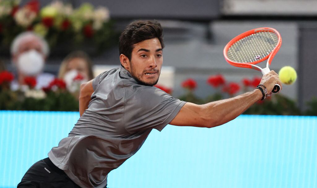 MADRID, SPAIN - MAY 07: Cristian Garín of Chile plays a backhand shot during their Quarter Final match against Matteo Berrettini of Italy during Day Nine of the Mutua Madrid Open at La Caja Magica on May 07, 2021 in Madrid, Spain. (Photo by Clive Brunskill/Getty Images)