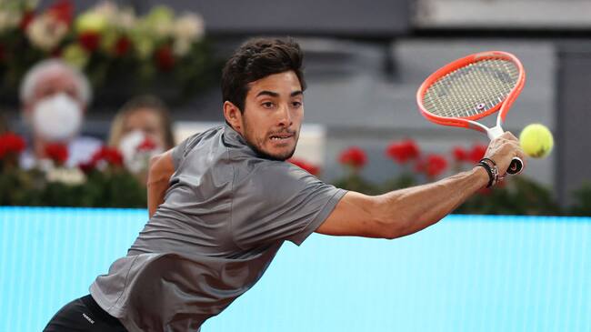 MADRID, SPAIN - MAY 07: Cristian Garín of Chile plays a backhand shot during their Quarter Final match against Matteo Berrettini of Italy during Day Nine of the Mutua Madrid Open at La Caja Magica on May 07, 2021 in Madrid, Spain. (Photo by Clive Brunskill/Getty Images)