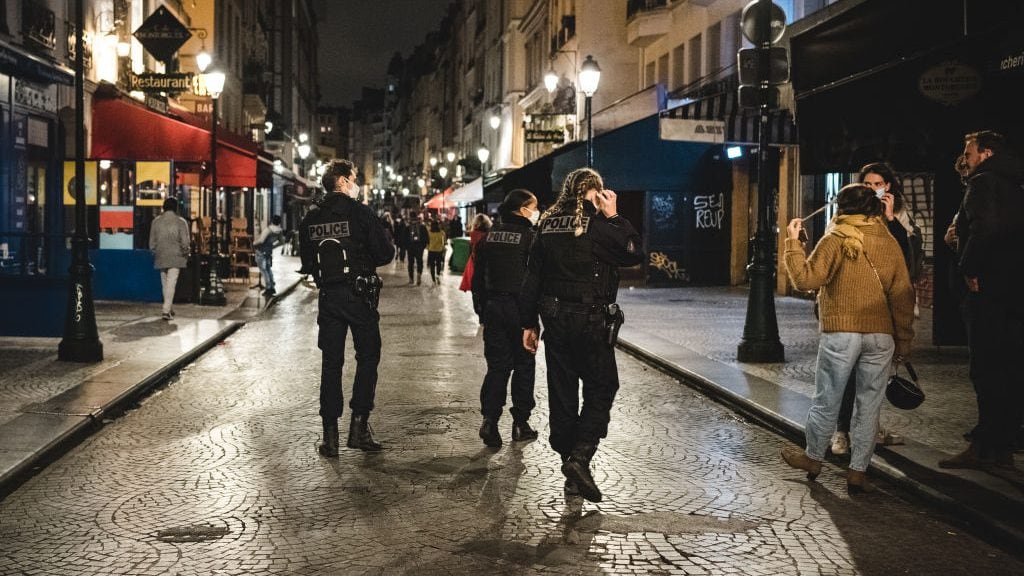 A police patrol is crisscrossing the streets of Paris to enforce the curfew introduced in Paris to deal with the resurgence of the coronavirus COVID-19 epidemic in Paris by the French government is effective since this Saturday, October 17, 2020 midnight for every day from 21h to 6h in the morning for at least a month. After an evening of celebration, the streets of Paris were emptied of its inhabitants to make way for the void. (Photo by Samuel Boivin/NurPhoto via Getty Images)