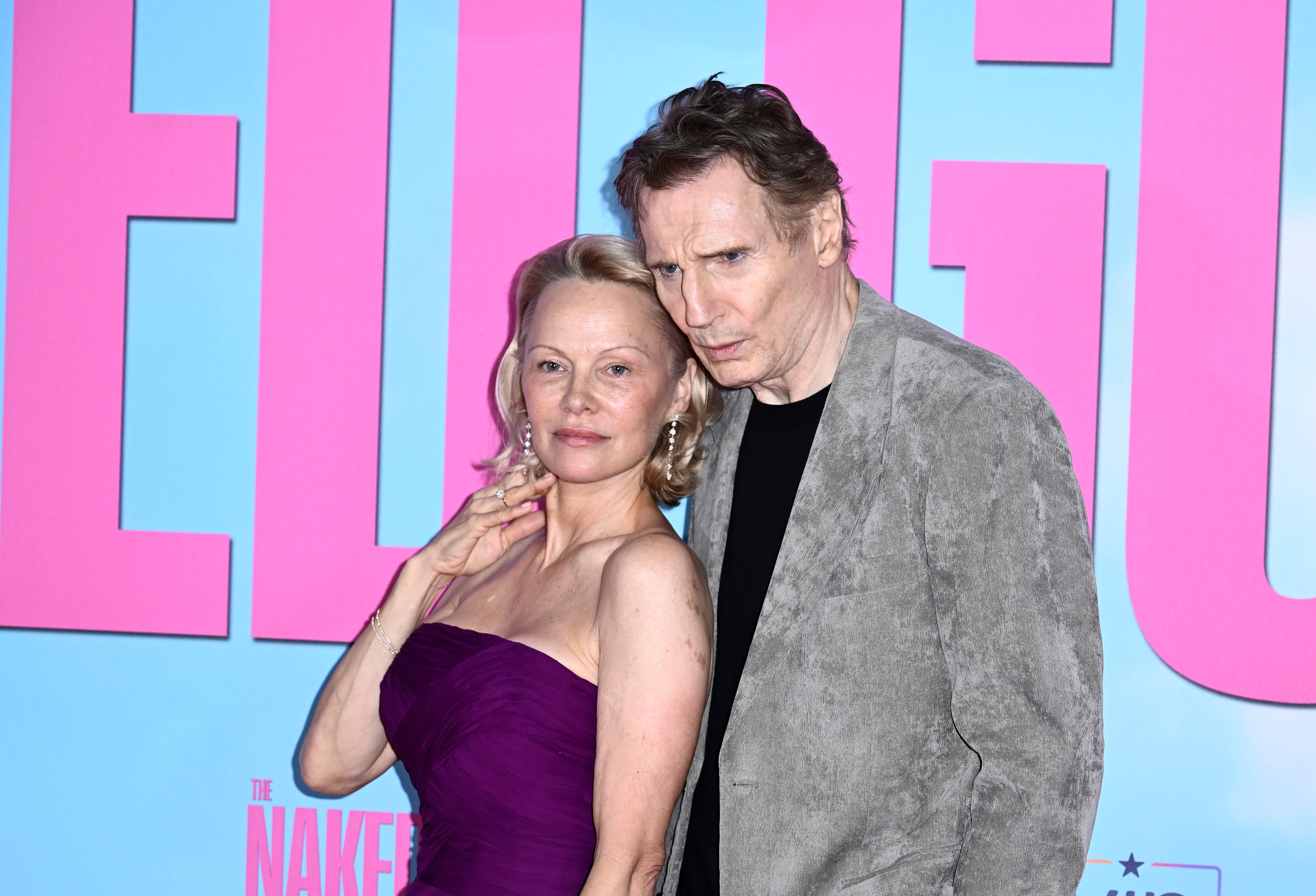 LONDON, ENGLAND - JULY 22: Pamela Anderson and Liam Neeson attend "The Naked Gun" UK Premiere at Cineworld Leicester Square on July 22, 2025 in London, England. (Photo by Gareth Cattermole/Getty Images)
