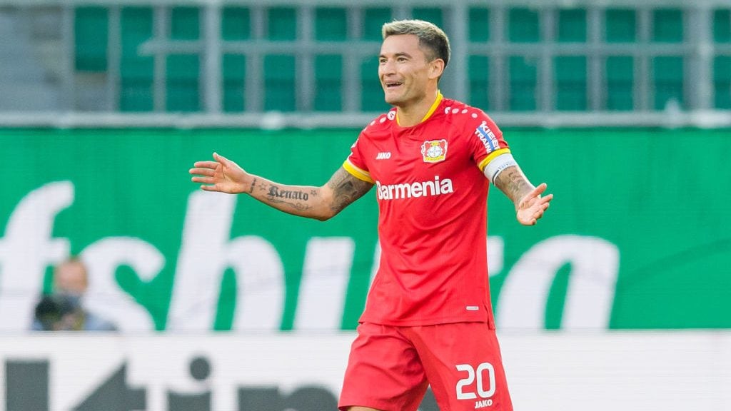 WOLFSBURG, GERMANY - SEPTEMBER 20: (BILD ZEITUNG OUT) Charles Aranguiz of Bayer 04 Leverkusen smiles during the Bundesliga match between VfL Wolfsburg and Bayer 04 Leverkusen at Volkswagen Arena on September 20, 2020 in Wolfsburg, Germany. Fans are set to return to Bundesliga stadiums in Germany despite to the ongoing Coronavirus Pandemic. Up to 20% of stadium's capacity are allowed to be filled. Final decisions are left to local health authorities and are subject to club's hygiene concepts and the infection numbers in the corresponding region. (Photo by Mario Hommes/DeFodi Images via Getty Images)