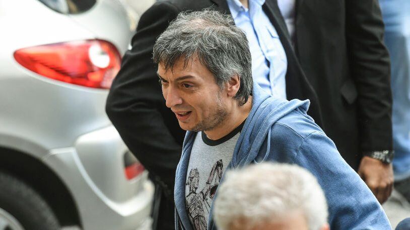 Argentine deputy Maximo Kirchner, son of former Argentine presidents Nestor and Cristina Kirchner, leaves a federal court in Buenos Aires, on October 23, 2018. - Maximo Kirchner was summoned by anti-corruption judge Claudio Bonadio as part of the investigation into the so-called "corruption notebooks" case. (Photo by EITAN ABRAMOVICH / AFP)        (Photo credit should read EITAN ABRAMOVICH/AFP via Getty Images)