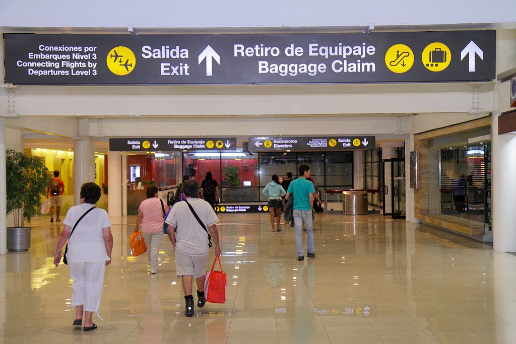 Comodoro Arturo Merino BenÍtez International Airport, baggage claim sign. (Photo by: Jeffrey Greenberg/Universal Images Group via Getty Images)