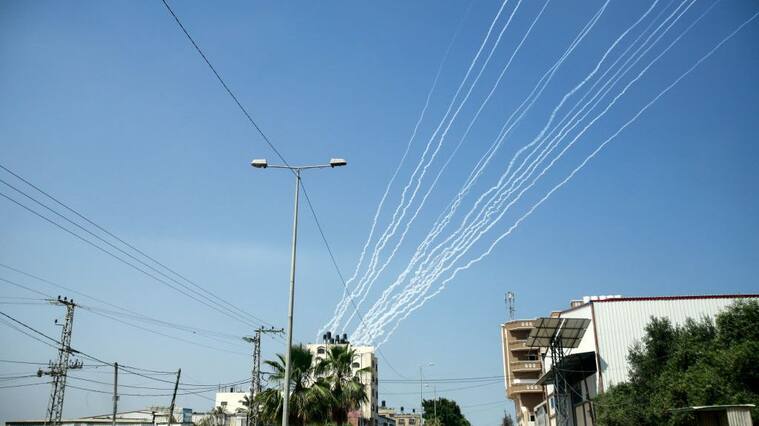 GAZA, PALESTINE - 2021/05/11: View of rockets fired from Gaza City towards IsraelPalestinians fired uninterrupted barrages of rockets into Israel, as its military pounded Gaza with air strikes through the early hours of Tuesday, in a dramatic escalation of clashes in Jerusalem. Explosions shook buildings throughout Gaza and rocket sirens sent Israelis in many southern towns scurrying for shelter overnight. Two Palestinians were killed and more than 100 wounded in air strikes, Palestinian officials said. (Photo by Ahmed Zakot/SOPA Images/LightRocket via Getty Images)