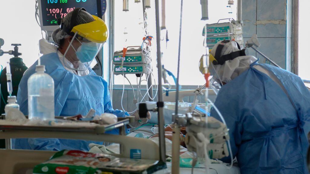 Health personnel care for children infected with COVID-19 at the Intensive Care ward of the Felipe Urriola Hospital in Iquitos, Peru on July 8, 2020. - Among the patients with COVID-19 in Peru are 24 children in the hospital in Iquitos, the largest city in the Peruvian Amazon, which was the first region in the country to feel the rigours of the pandemic. (Photo by Cesar Von BANCELS / AFP) (Photo by CESAR VON BANCELS/AFP via Getty Images)