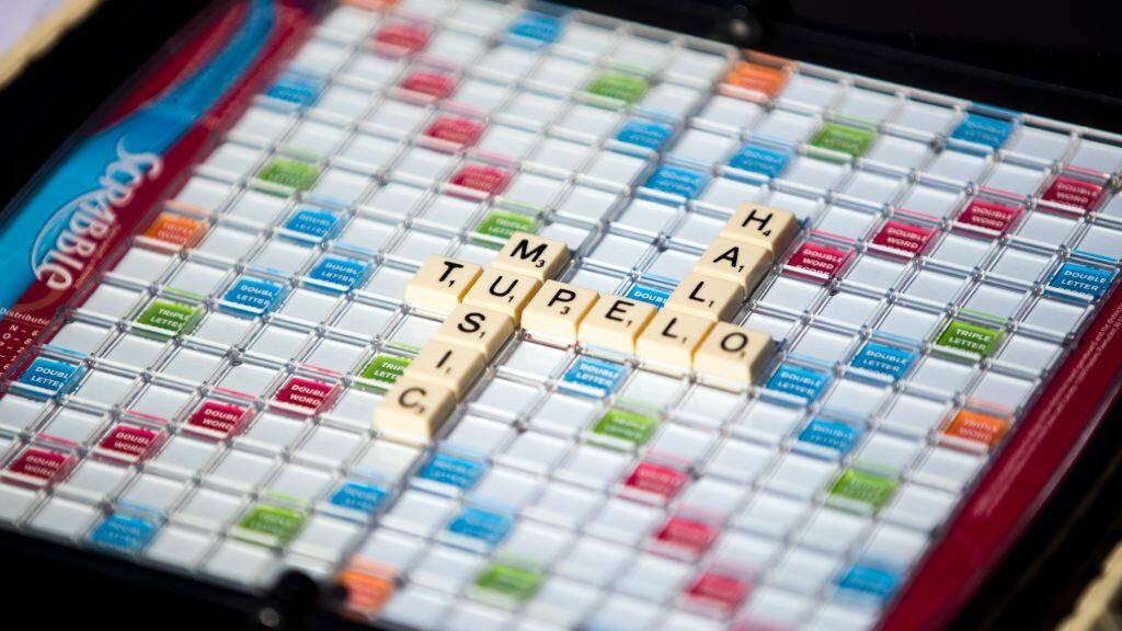 People play scrabble as they watch Tim Theriault perform at the first drive-in concert since the coronavirus outbreak at Tupelo Music Hall in Derry, NH on May 16, 2020. (Photo by Adam Glanzman/For The Washington Post via Getty Images)