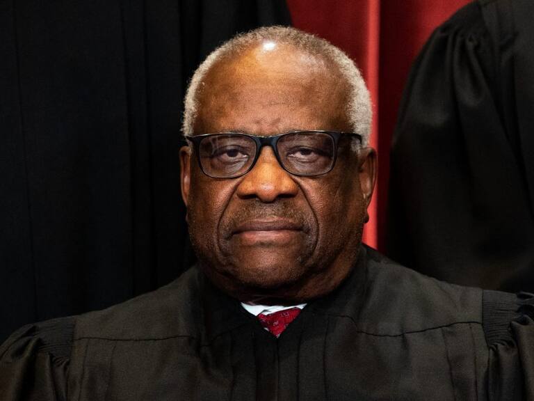 WASHINGTON, DC - APRIL 23: Associate Justice Clarence Thomas sits during a group photo of the Justices at the Supreme Court in Washington, DC on April 23, 2021. (Photo by Erin Schaff-Pool/Getty Images)