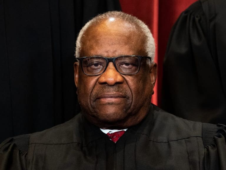 WASHINGTON, DC - APRIL 23: Associate Justice Clarence Thomas sits during a group photo of the Justices at the Supreme Court in Washington, DC on April 23, 2021. (Photo by Erin Schaff-Pool/Getty Images)
