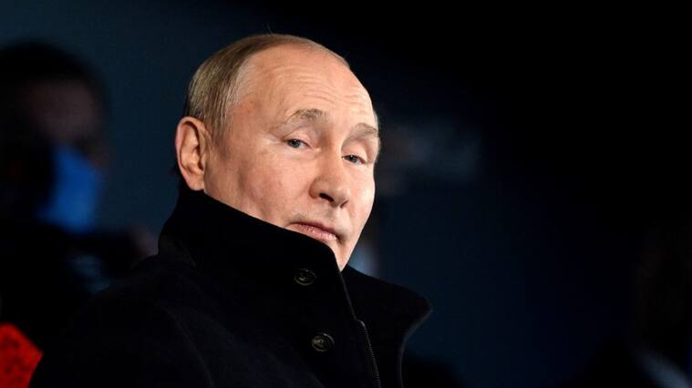 TOPSHOT - Russia's President Vladimir Putin looks on during the opening ceremony of the Beijing 2022 Winter Olympic Games, at the National Stadium, known as the Bird's Nest, in Beijing, on February 4, 2022. (Photo by WANG Zhao / AFP) (Photo by WANG ZHAO/AFP via Getty Images)