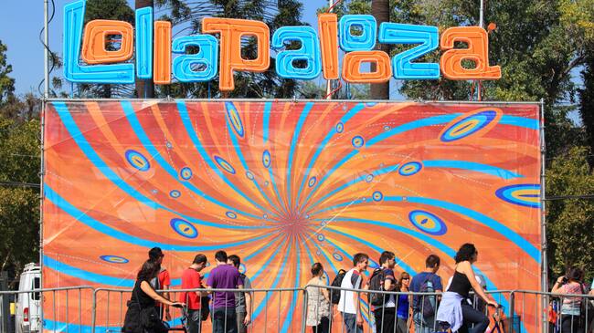 Santiago, Chile - April 02, 2011: People coming to rock concert "Lollapalooza Chile 2011" in O'Higgins Park. Being the first time the concert was held outside the U.S.