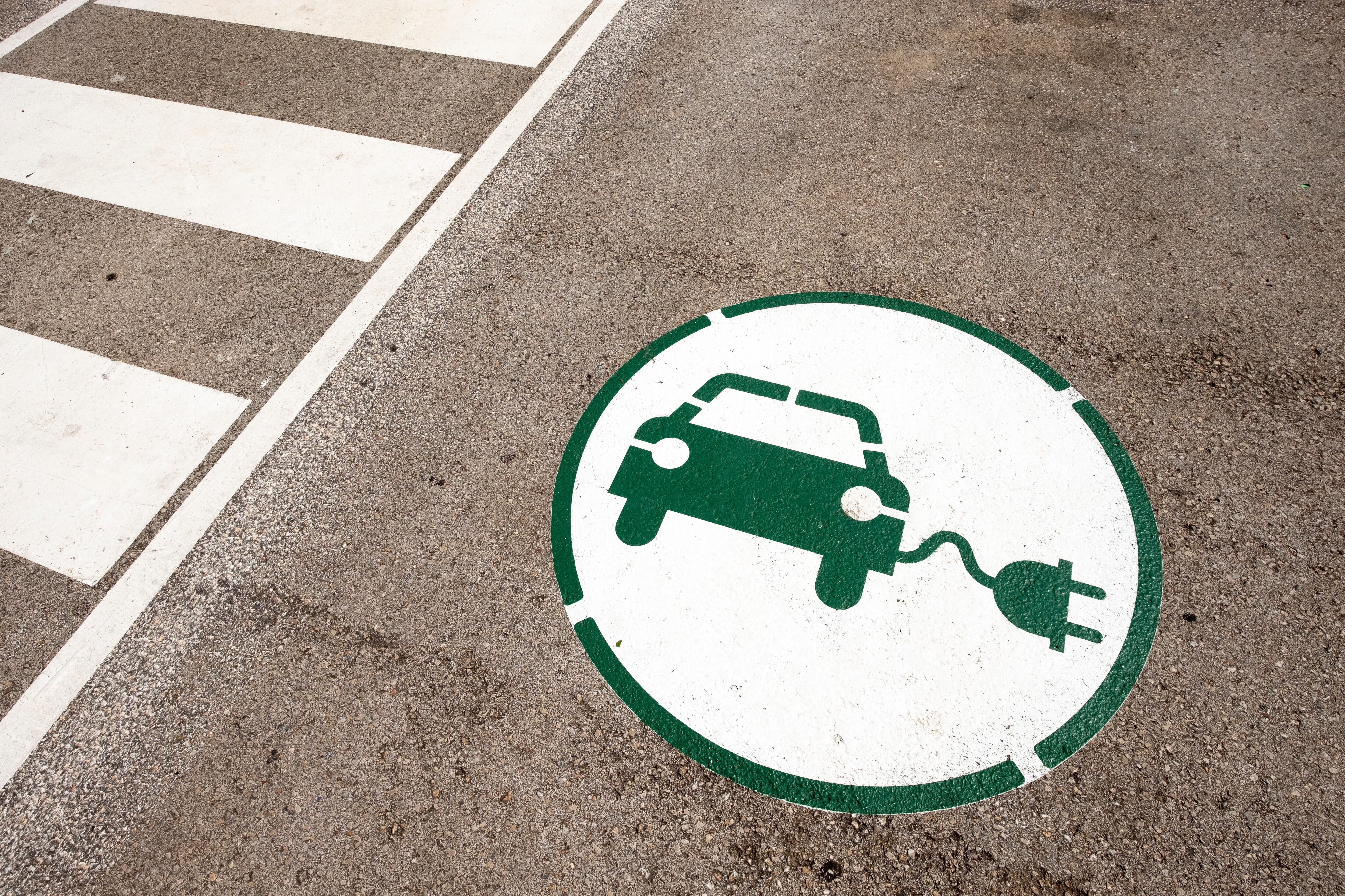Symbol indicating a place to charge an electric car with energy in Catalonia Spain.