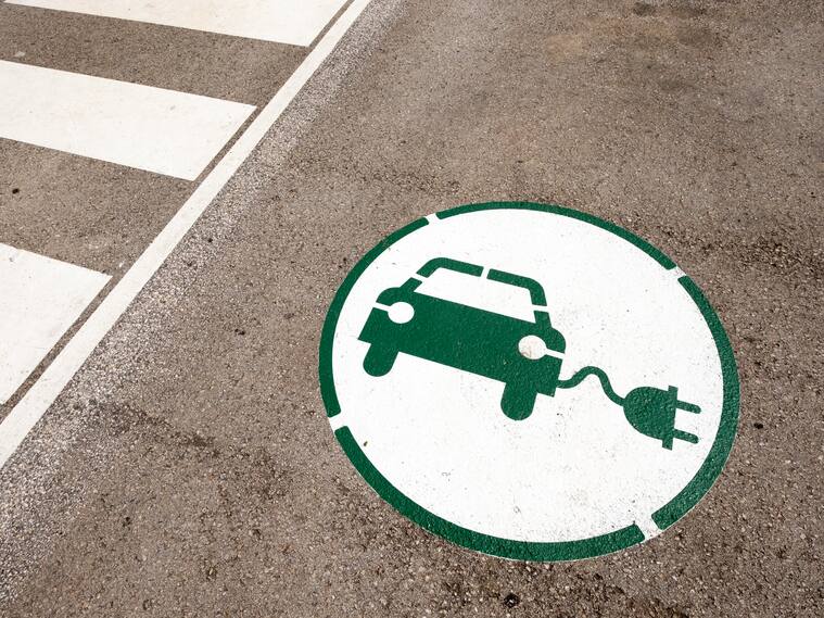 Symbol indicating a place to charge an electric car with energy in Catalonia Spain.