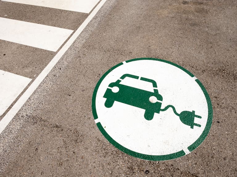 Symbol indicating a place to charge an electric car with energy in Catalonia Spain.