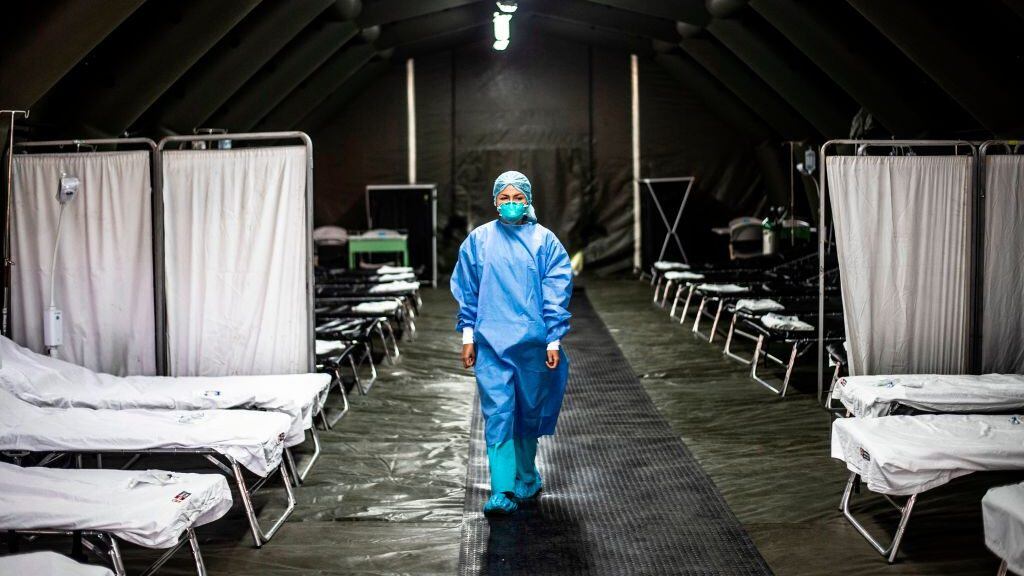TOPSHOT - A specialist walks inside a mobile unit set up by the Peruvian Ministry of Health as a preventive measure if a case of the COVID-19 virus comes up, at the Hipolito Unanue Hospital, in Lima on February 27, 2020. - So far, Peru has no record of the COVID-19 virus cases. (Photo by Ernesto BENAVIDES / AFP) (Photo by ERNESTO BENAVIDES/AFP via Getty Images)