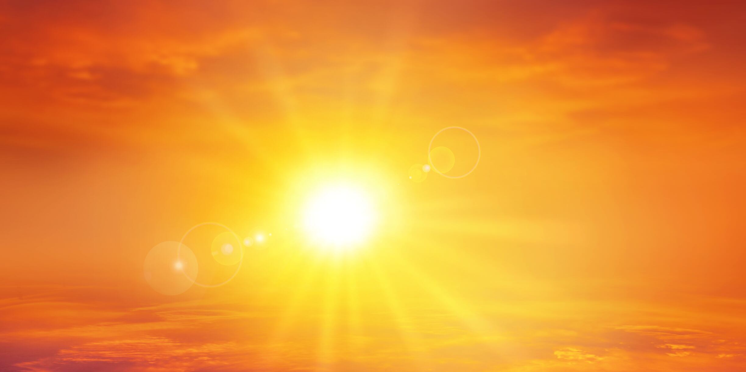 High resolution sky background with a radiant setting sun