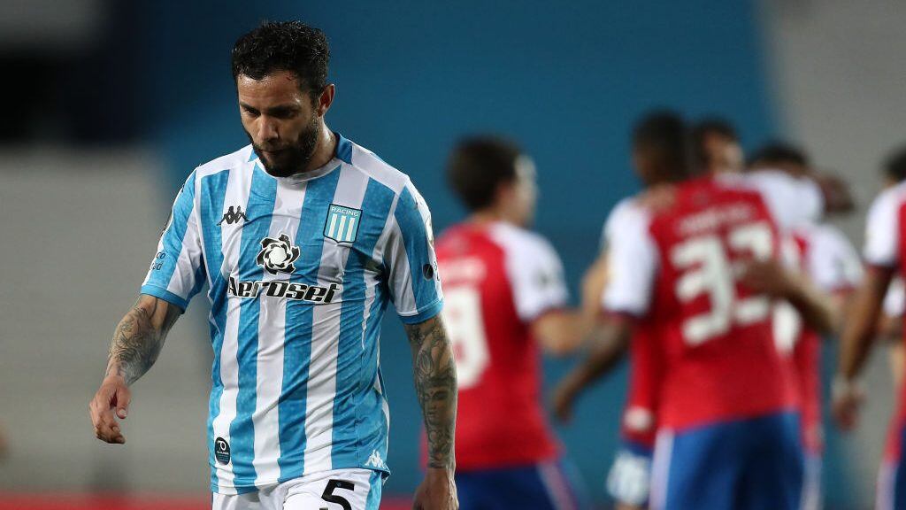 AVELLANEDA, ARGENTINA - SEPTEMBER 17: Eugenio Mena of Racing Club looks dejected after a group F match of Copa CONMEBOL Libertadores 2020 between Racing and Nacional at Juan Domingo Peron Stadium on September 17, 2020 in Avellaneda, Argentina. All games of the tournament are played behind closed doors to avoid spread of COVID-19. (Photo by Agustin Marcarian- Pool/Getty Images)