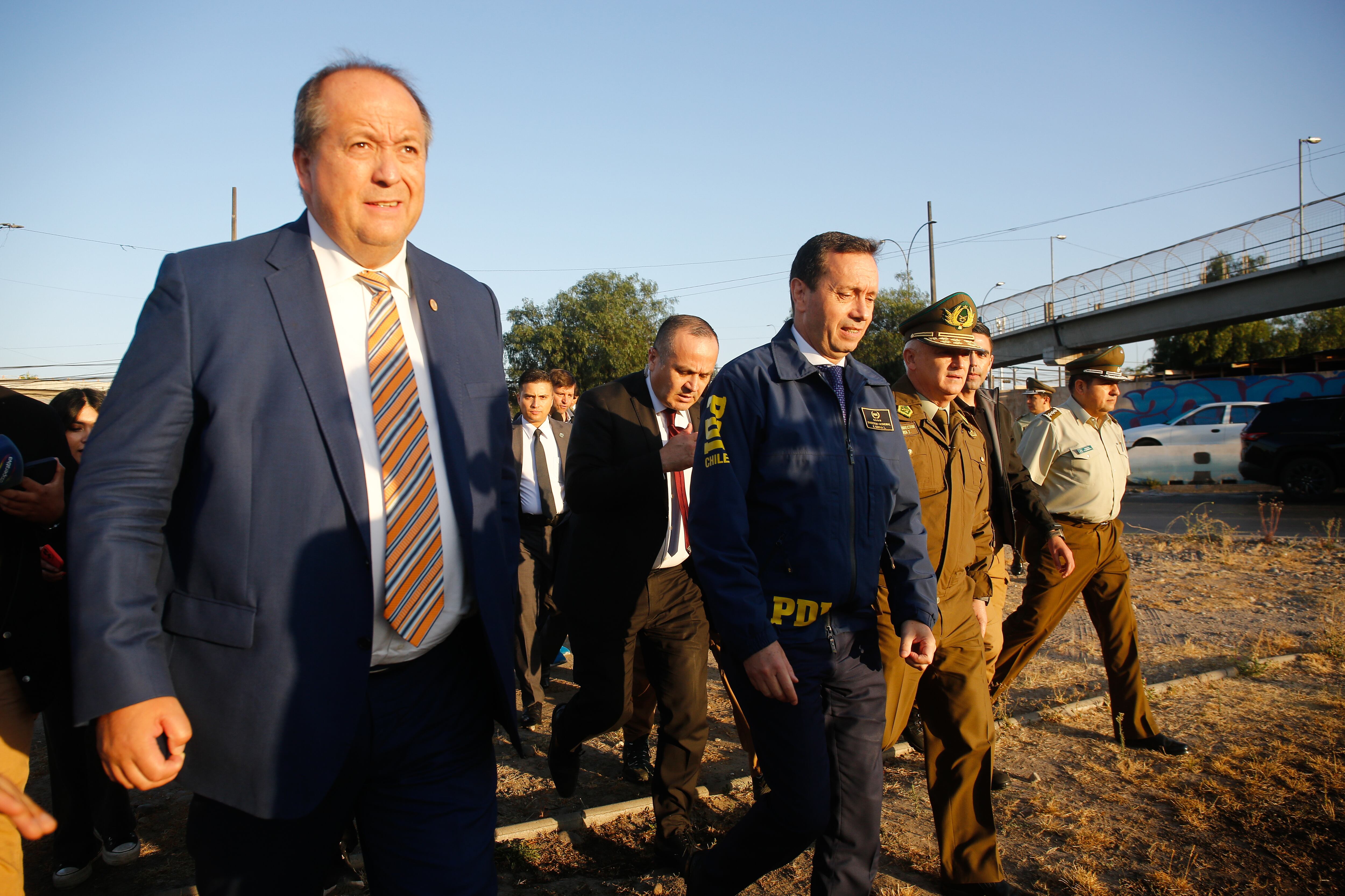 Agencia UNO | El fiscal nacional, Ángel Valencia, junto a otros altos mandos de la PDI, Carabineros y Gendarmería