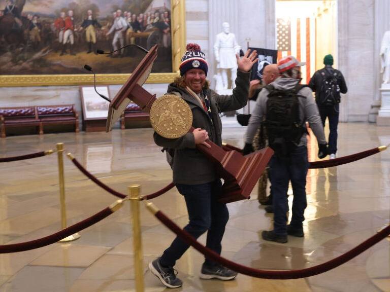 WASHINGTON, DC - JANUARY 06: Protesters enter the U.S. Capitol Building on January 06, 2021 in Washington, DC. Congress held a joint session today to ratify President-elect Joe Biden's 306-232 Electoral College win over President Donald Trump. A group of Republican senators said they would reject the Electoral College votes of several states unless Congress appointed a commission to audit the election results. (Photo by Win McNamee/Getty Images)