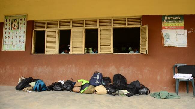 Final year students of Babs Fafunwa Millennium Senior Grammar School, Ojodu, Lagos, Nigeria, drop their bags outside their classroom as they begin The West African Senior Secondary Certificate Examinations after their two weeks resumption, on Monday, August 17, 2020. The government has lifted lockdown order over COVID-19 pandemic and allowed final year Students to resume school August 4, 2020 in preparation for their examinations. (Photo by Olukayode Jaiyeola/NurPhoto via Getty Images)