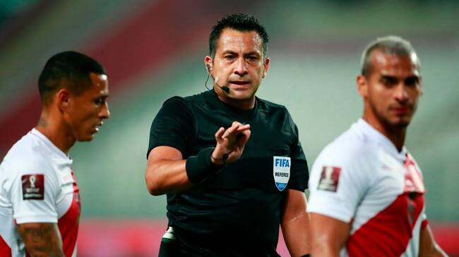 Chilean referee Julio Bascunan conducts the 2022 FIFA World Cup South American qualifier football match between Peru and Brazil at the National Stadium in Lima, on October 13, 2020, amid the COVID-19 novel coronavirus pandemic. (Photo by Daniel APUY / POOL / AFP) (Photo by DANIEL APUY/POOL/AFP via Getty Images)