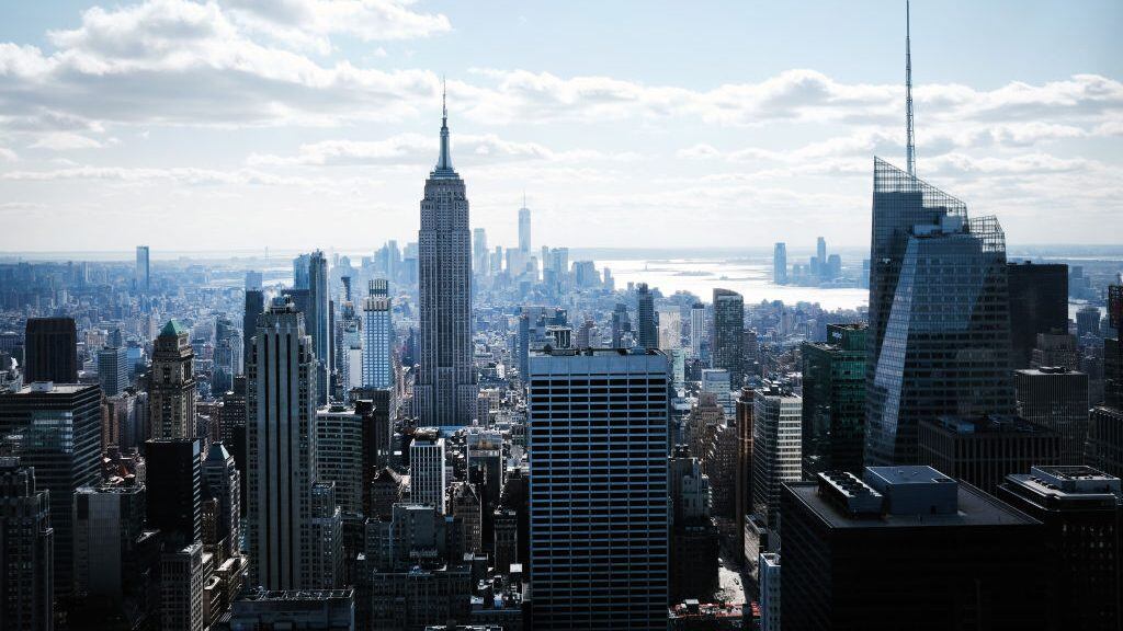 NEW YORK, NEW YORK - MARCH 04: The Empire State Building towers above other largely empty office buildings on March 04, 2021 in New York City. According to Colliers International, in January the office available rate in Manhattan rose to 14.9%, which is the highest level on record dating back to 2000. Some companies are slowly asking employees to return to the office while other's are waiting for more New Yorkers to receive the vaccine for Covid-19. (Photo by Spencer Platt/Getty Images)