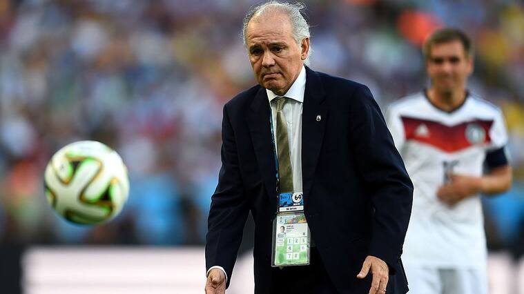 RIO DE JANEIRO, BRAZIL - JULY 13: Head coach Alejandro Sabella of Argentina gathers the ball during the 2014 FIFA World Cup Brazil Final match between Germany and Argentina at Maracana on July 13, 2014 in Rio de Janeiro, Brazil. (Photo by Mike Hewitt - FIFA/FIFA via Getty Images)