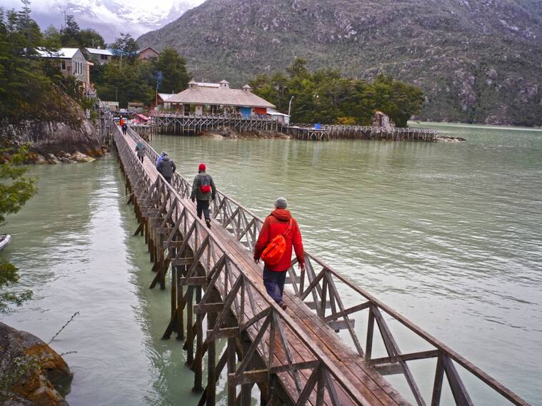The remote village of Tortel is interconnected by a series of wooden boardwalks. (Photo by: Kike Calvo/Universal Images Group via Getty Images)